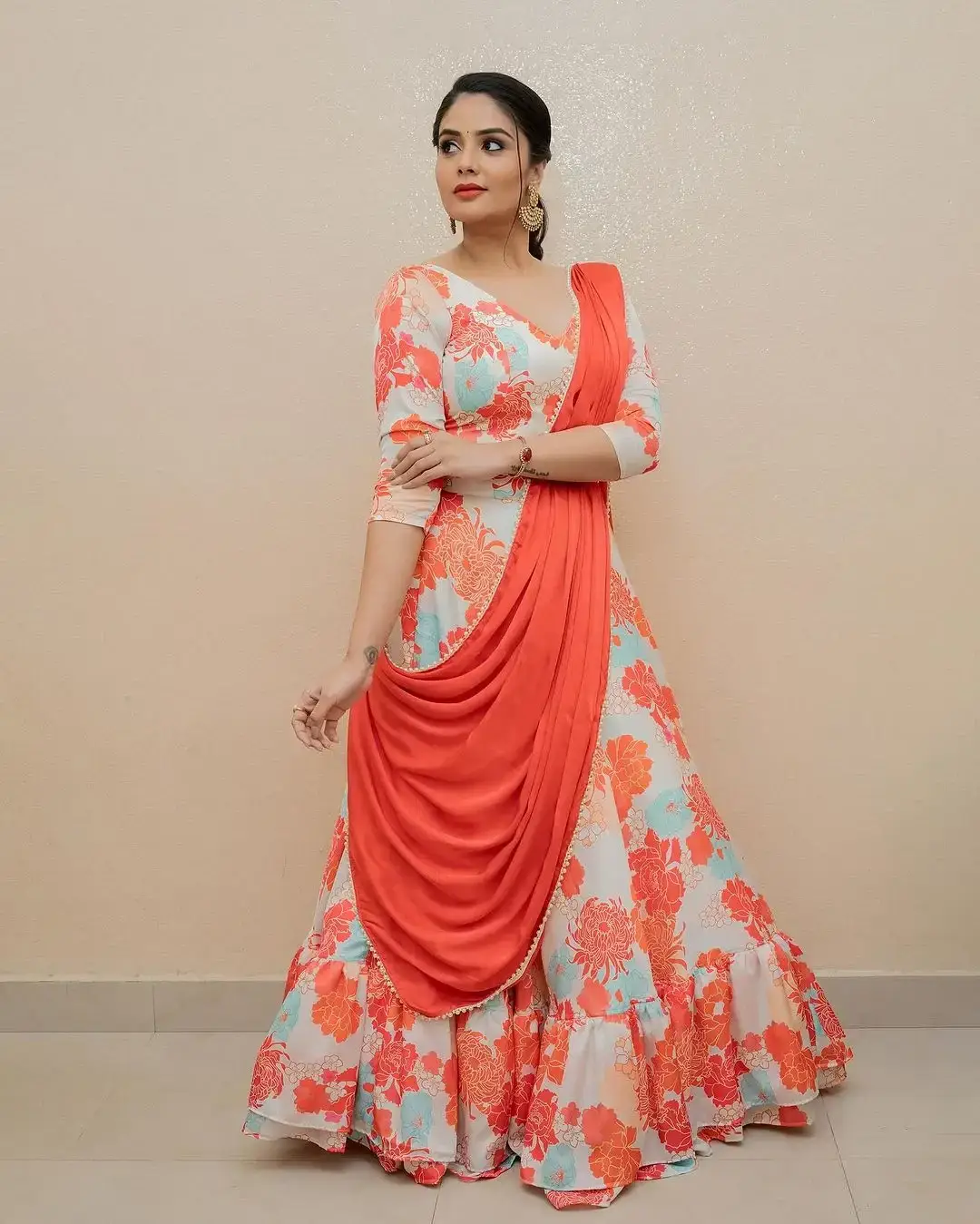 Beautiful Indian Actress Sreemukhi in Orange Lehenga Choli